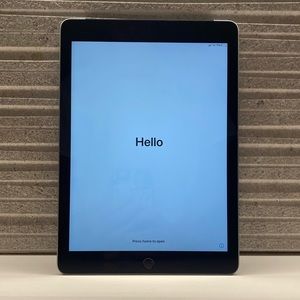 iPad 6th Generation WiFi + Cellular 32GB